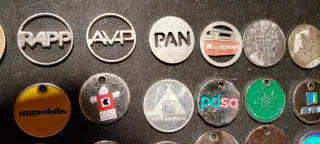 58 gettoni esteri in metallo tutti diversi