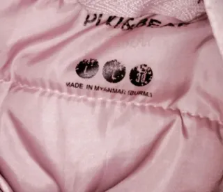 Plumífero rosa con capucha