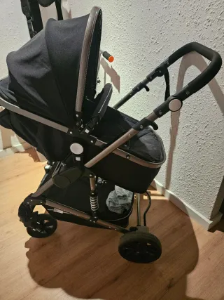 Carrito de bebé negro se forma de 3 maneras