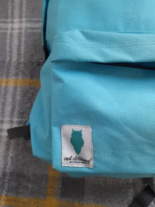 Mochila azul y gris owl clothing