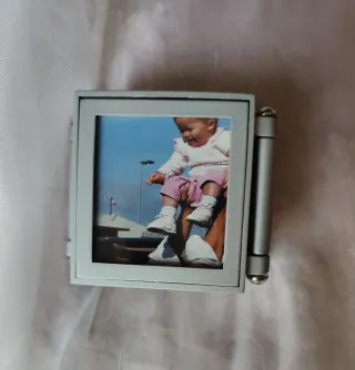 Portarretratos triple plata con reloj