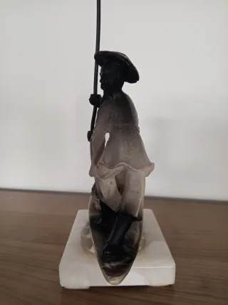 Escultura de pescadores en barca