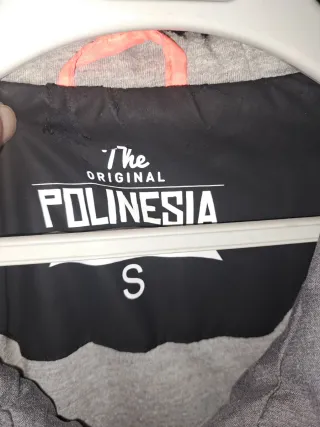 Cortavientos chico negro y gris