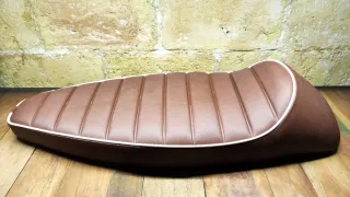 Asiento Vespa 125/150/200 Marron ribete blanco