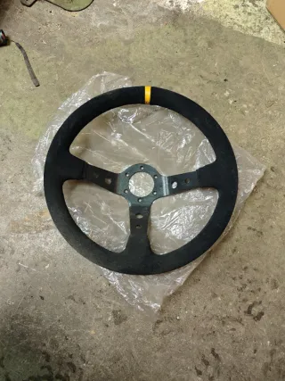 Volante desplazado piel vuelta