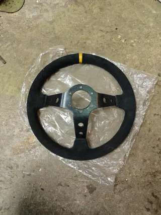 Volante desplazado piel vuelta