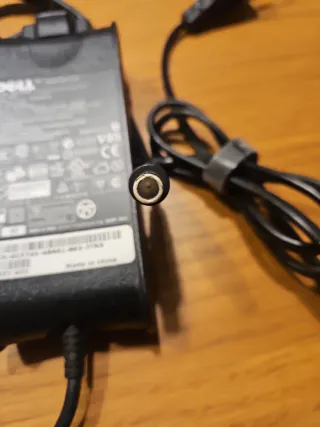 Cargador portátil Dell original DA65NS0