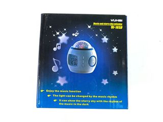 Despertador infantil y proyector cielo estrellado