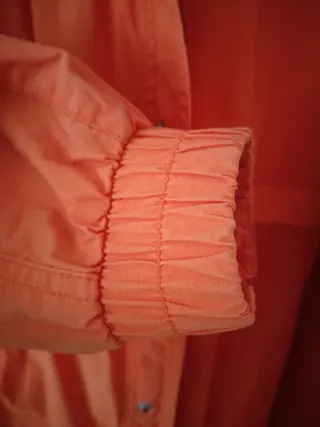 Cazadora impermeable caballero naranja