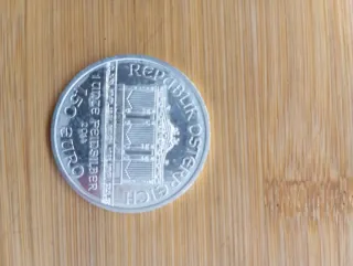 2 onzas plata filarmónica + 2 monedas 12 euros