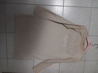 Vestido beige con flecos