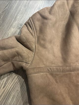 Abrigo de piel de mouton vuelta.