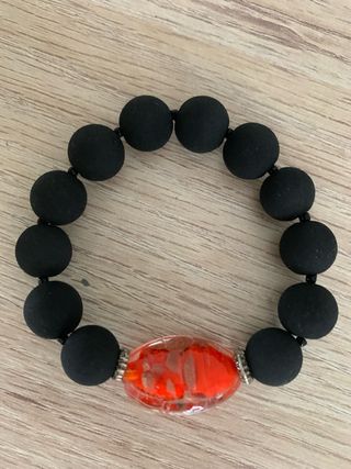 Conjunto de bisutería: collar, pulsera y pendiente