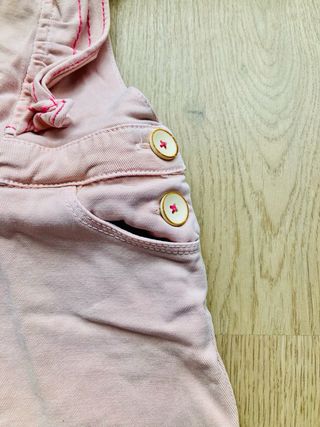 Peto rosa con volantes