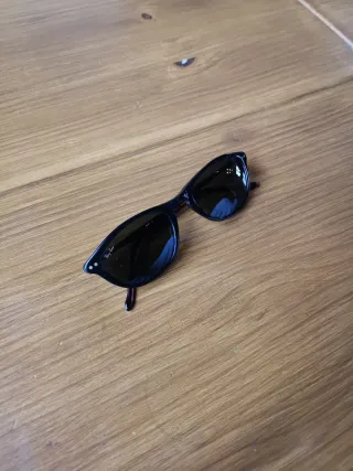 Gafas de sol Ray-Ban marrón negras.