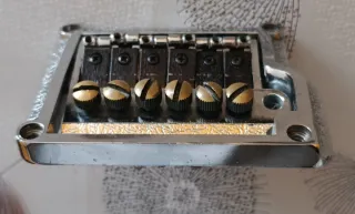 Puente de guitarra cromado