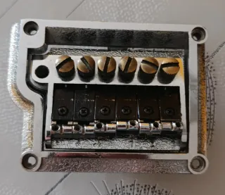 Puente de guitarra cromado