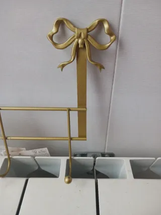 Espejo de sobremesa con lazo dorado