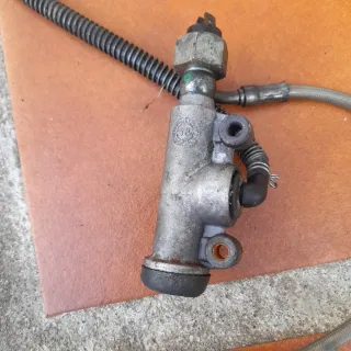 Bomba y pinza freno trasero Suzuki RMX 50