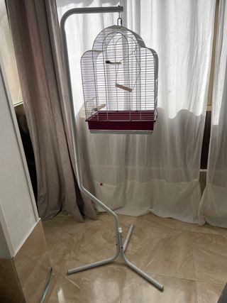 Jaula para pájaros roja y blanca