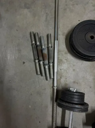 Panca piana e pesi palestra