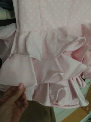 Traje de flamenca rosa con volantes