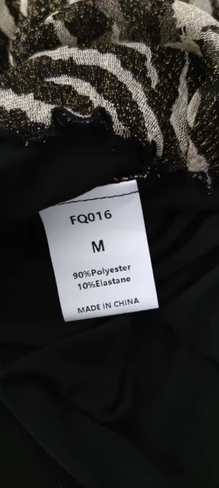 Vestido sexy estampado cebra con transparencia.