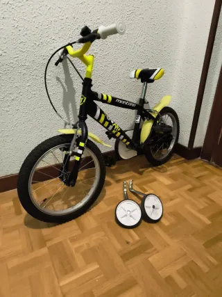 Bicicleta infantil amarilla y negra