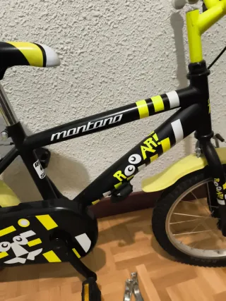 Bicicleta infantil amarilla y negra