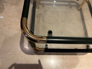 Mesa baja cristal y metal dorado