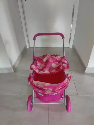 Carrito de muñecas rosa