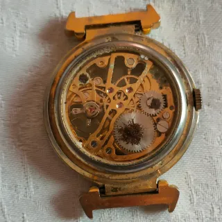 Orologio scheletrato oro e argento
