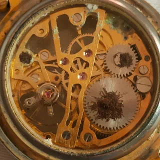 Orologio scheletrato oro e argento