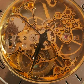 Orologio scheletrato oro e argento