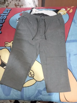 Pantalones grises formales tiro bajo