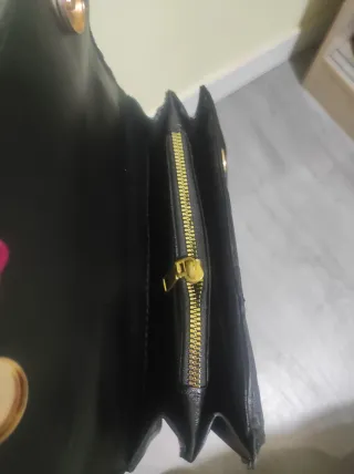 Bolso Pinko negro y dorado