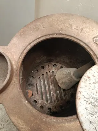Estufa de leña metálica