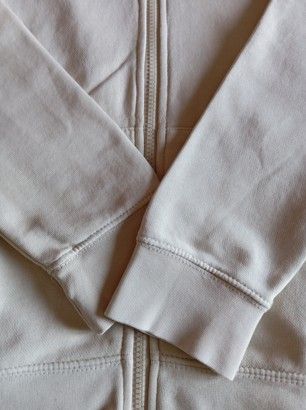 Chaqueta Nike Club Fleece Beige logo bordado