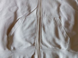 Chaqueta Nike Club Fleece Beige logo bordado