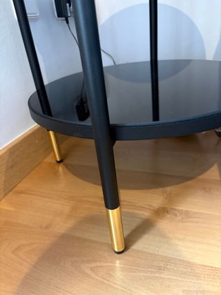 Mesa auxiliar redonda cristal negro y oro