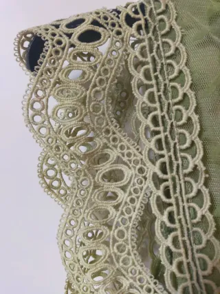 Abito verde con pizzo