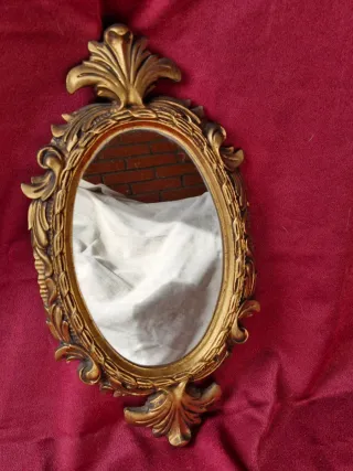 Pareja de espejos cornucopia dorados