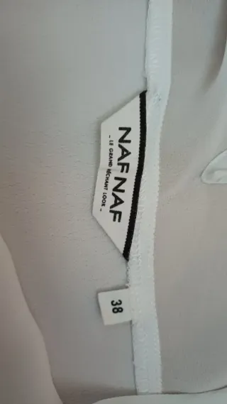 Camiseta / blusa blanca sin mangas