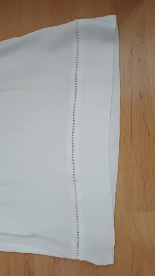 Camiseta / blusa blanca sin mangas