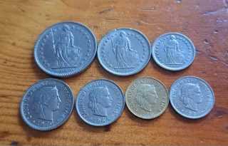 Set de 7 monedas de Suiza antiguas diferentes