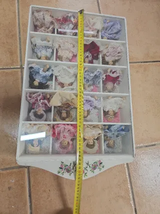 Casita con 20 muñecas