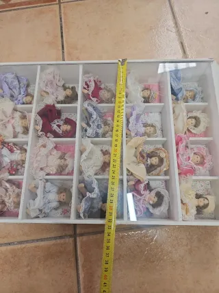 Casita con 20 muñecas