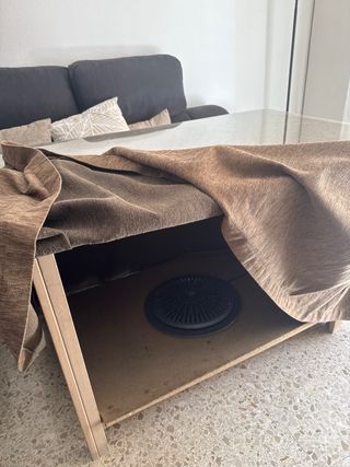 Mesa de salón con tapa de cristal