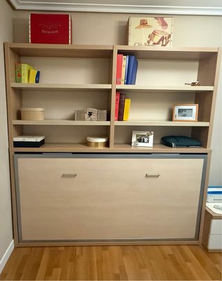 Habitación con cama abatible