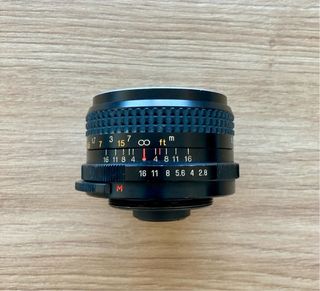 Objetivo Tokina RMC 35mm f/2.8. Reparar o piezas.
